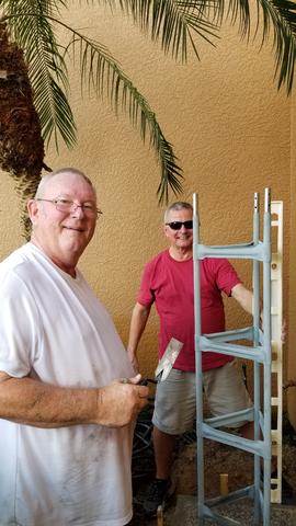 Tower base installed. Bob and Ron showing off their handiwork.